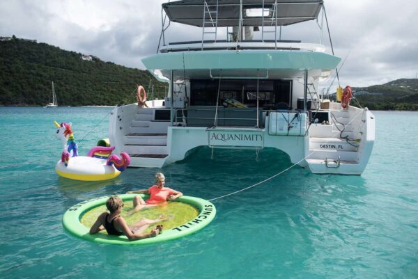 family BVI charters playing in the caribbean sea
